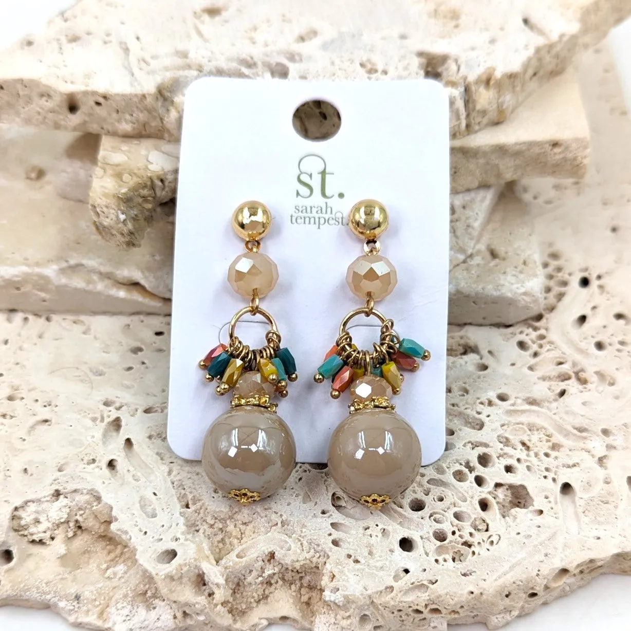 Dangle earrings with round bead and other small beads
