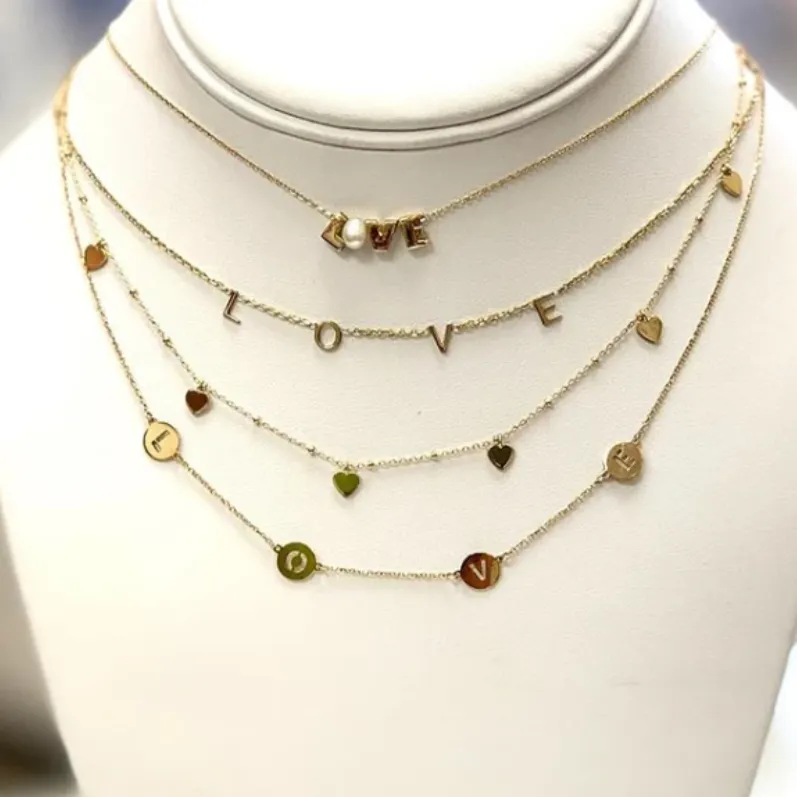 Love cut out disc letters Necklace
