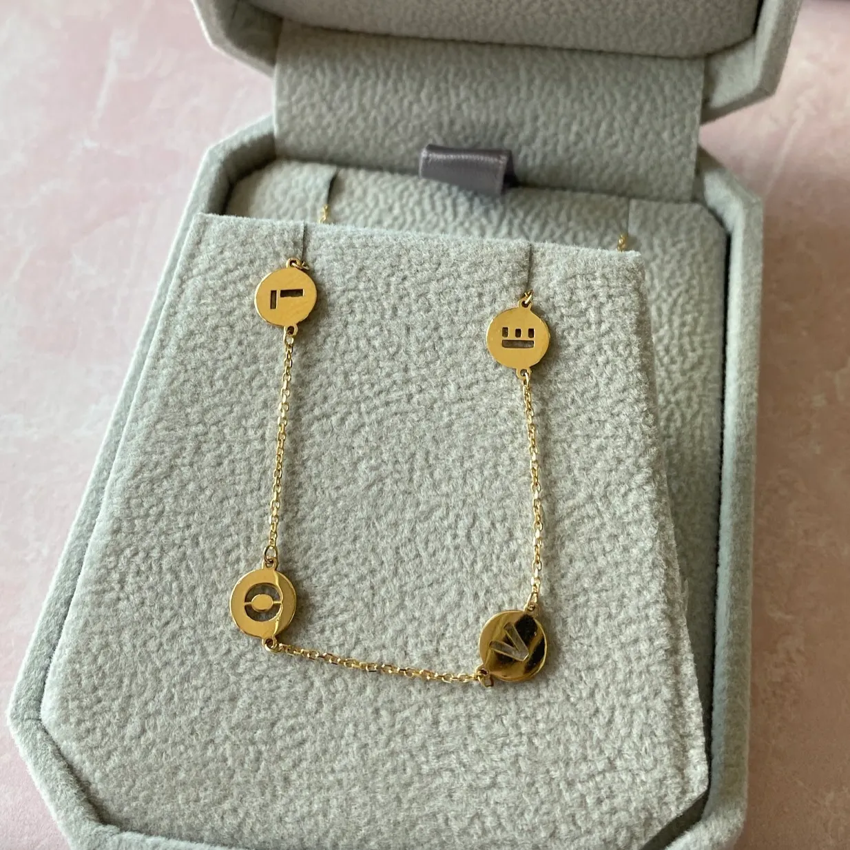 Love cut out disc letters Necklace